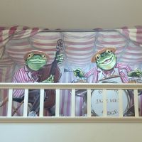 Frog Jazz Quartet cut-outs and background. In this commission the clients wanted something to fill an architectural oddity of their breakfast room, a shelf over the ceiling of an adjoining utility room. I came up with a minstrels gallery with a frog jazz quartet. The medium is acrylic on to emulsion on plaster. Plus MDF cut-outs. Completed June 2007.